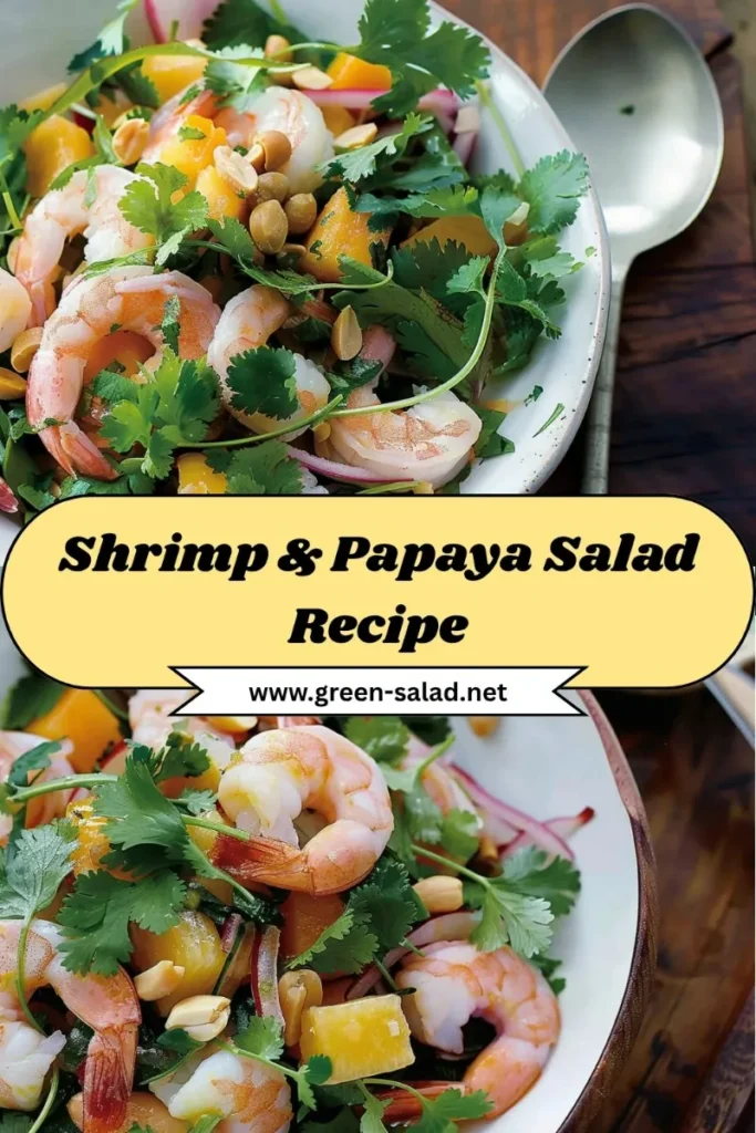 Shrimp & Papaya Salad: Fresh, Flavorful, and Perfect for Any Occasion 5 Bowl of shrimp and papaya salad with cilantro, peanuts, and red onion, served fresh as a healthy tropical dish.